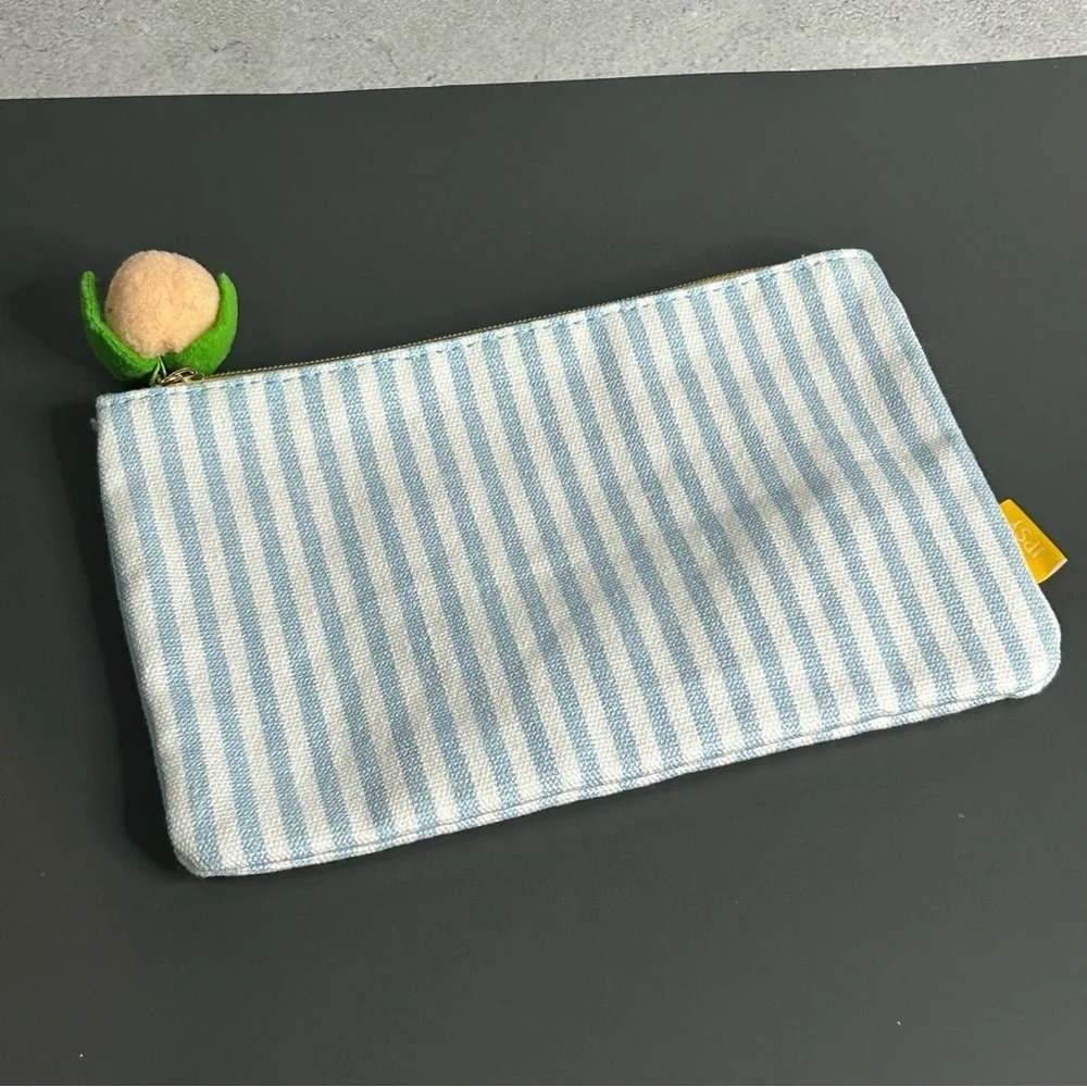 ipsy Blue and White Striped Cosmetic Bag with Peach Accent